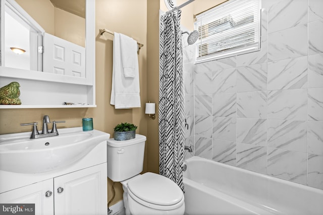 326 E 28th St, Baltimore, MD 21218 - bathroom featuring toilet, vanity, and shower / tub combo with curtain