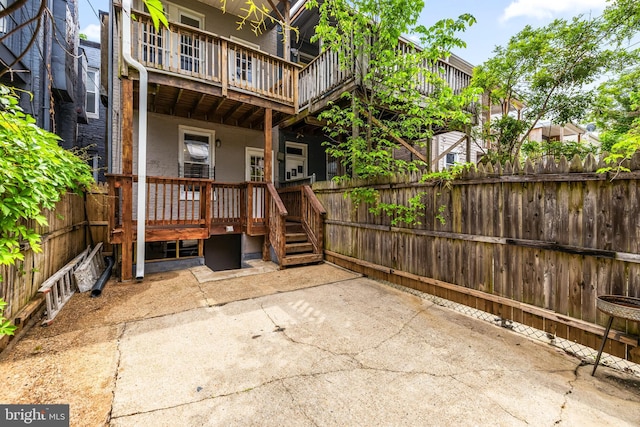 326 E 28th St, Baltimore, MD 21218 - view of patio with fence and a porch