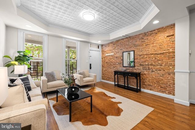 326 E 28th St, Baltimore, MD 21218 - living area featuring a tray ceiling, crown molding, baseboards, wood finished floors, and recessed lighting