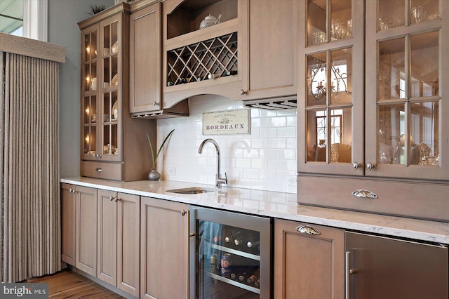 29325 Andrew Jackson Dr, Millsboro, DE 19966 - indoor wet bar with beverage cooler, backsplash, and wood finished floors