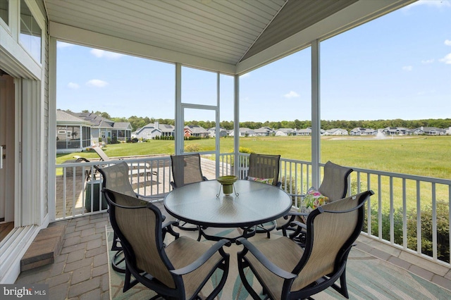 29325 Andrew Jackson Dr, Millsboro, DE 19966 - sunroom / solarium featuring outdoor dining space, a residential view, and vaulted ceiling