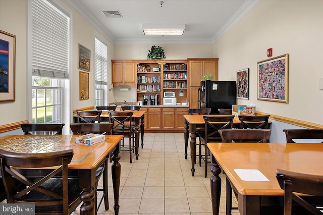 29325 Andrew Jackson Dr, Millsboro, DE 19966 - dining area featuring ornamental molding and light tile patterned flooring