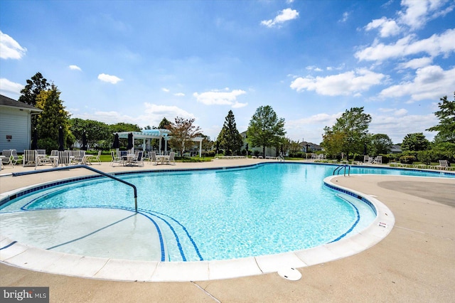 29325 Andrew Jackson Dr, Millsboro, DE 19966 - community pool featuring a patio and a pergola