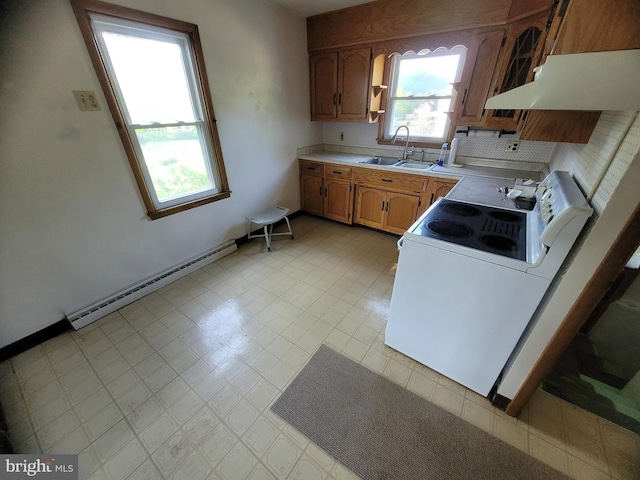 155 Hyndman Rd, Hyndman, PA 15545 - kitchen with a baseboard heating unit, a sink, white range with electric stovetop, light countertops, and light floors