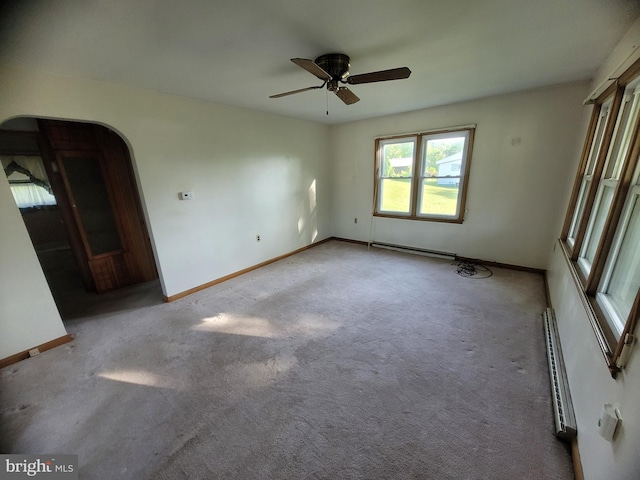 155 Hyndman Rd, Hyndman, PA 15545 - spare room featuring baseboard heating, a ceiling fan, baseboards, and carpet floors