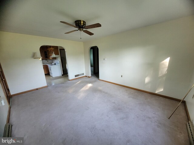 155 Hyndman Rd, Hyndman, PA 15545 - unfurnished bedroom featuring arched walkways, baseboards, light colored carpet, and ceiling fan