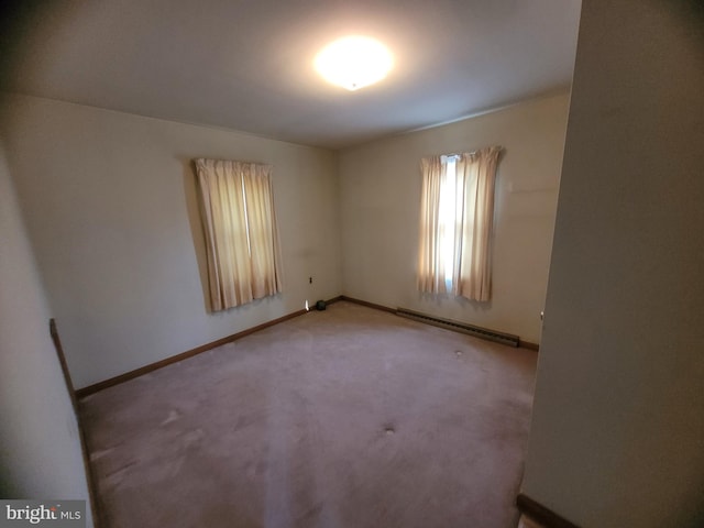 155 Hyndman Rd, Hyndman, PA 15545 - carpeted empty room featuring a baseboard heating unit and baseboards