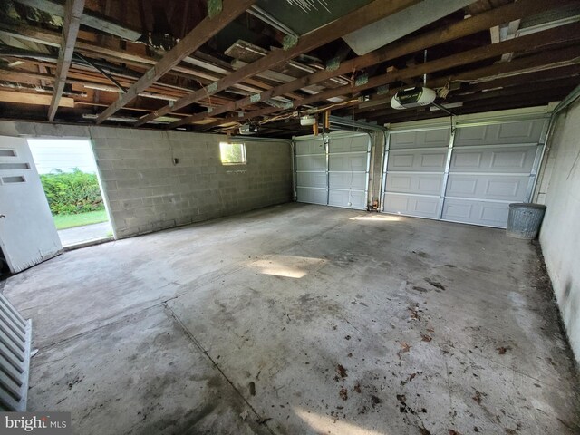 155 Hyndman Rd, Hyndman, PA 15545 - garage with a garage door opener and concrete block wall