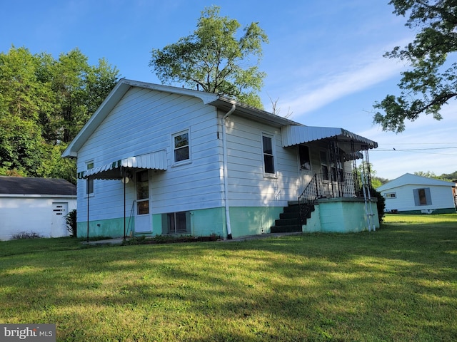 155 Hyndman Rd, Hyndman, PA 15545 - view of side of property with a lawn