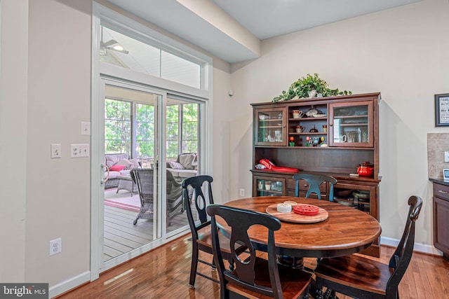 31027 Scissorbill Rd, Ocean View, DE 19970 - dining area with light wood-style flooring, baseboards, and ceiling fan