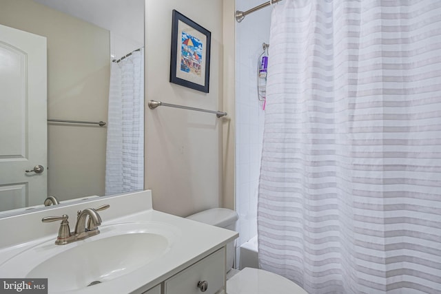 31027 Scissorbill Rd, Ocean View, DE 19970 - bathroom featuring toilet, vanity, and shower / tub combo with curtain