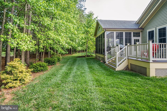 31027 Scissorbill Rd, Ocean View, DE 19970 - view of grassy yard featuring a sunroom and a deck