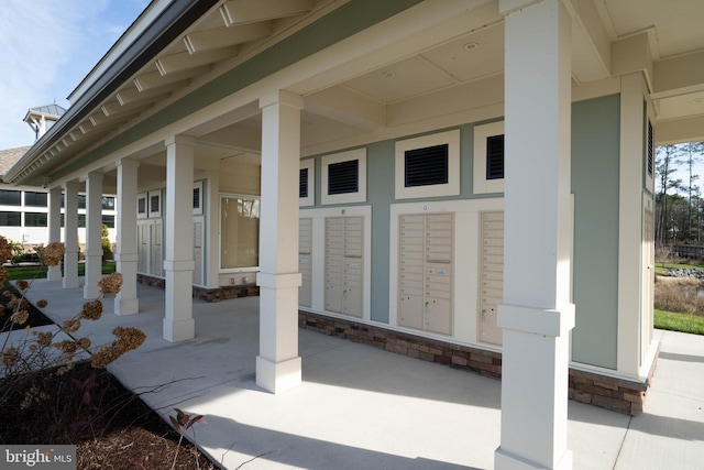 31027 Scissorbill Rd, Ocean View, DE 19970 - view of patio / terrace with mail area