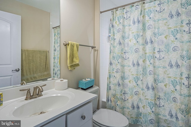 31027 Scissorbill Rd, Ocean View, DE 19970 - bathroom featuring toilet, vanity, and shower / bathtub combination with curtain