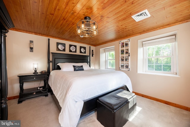 305 Gunhart Rd, Mohnton, PA 19540 - bedroom with light colored carpet, wooden ceiling, baseboards, and a chandelier