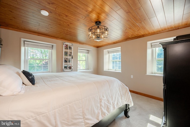 305 Gunhart Rd, Mohnton, PA 19540 - carpeted bedroom featuring wooden ceiling, multiple windows, baseboards, a chandelier, and ornamental molding