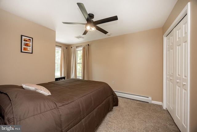305 Gunhart Rd, Mohnton, PA 19540 - bedroom featuring a baseboard heating unit, carpet flooring, a closet, baseboards, and a ceiling fan