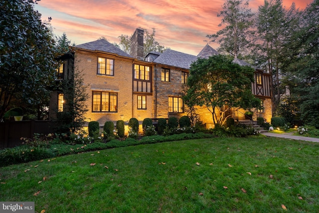 5033 Tilden St NW, Washington, DC 20016 - view of front of home with a chimney and a high end roof