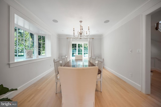 5033 Tilden St NW, Washington, DC 20016 - dining space with a chandelier, light wood-type flooring, baseboards, and ornamental molding