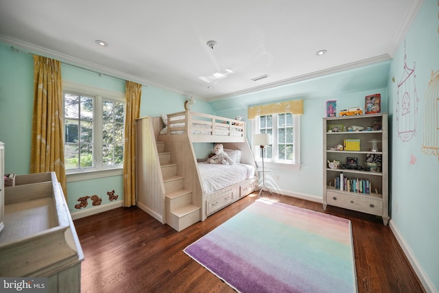 5033 Tilden St NW, Washington, DC 20016 - bedroom with crown molding, multiple windows, wood finished floors, and baseboards