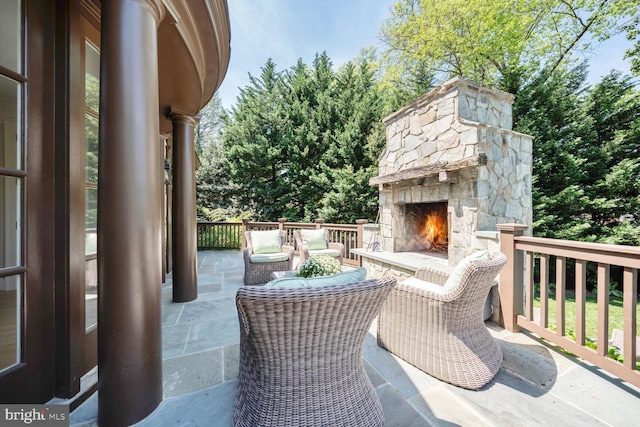 5033 Tilden St NW, Washington, DC 20016 - view of patio / terrace featuring an outdoor stone fireplace