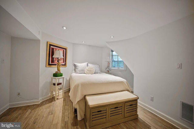 5033 Tilden St NW, Washington, DC 20016 - bedroom with wood finished floors, baseboards, and recessed lighting