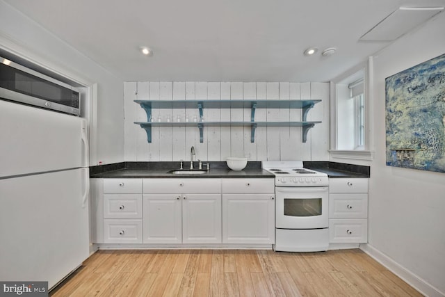 5033 Tilden St NW, Washington, DC 20016 - kitchen with open shelves, white appliances, a sink, white cabinets, and recessed lighting