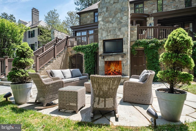 5033 Tilden St NW, Washington, DC 20016 - view of patio featuring stairs and an outdoor living space with a fireplace