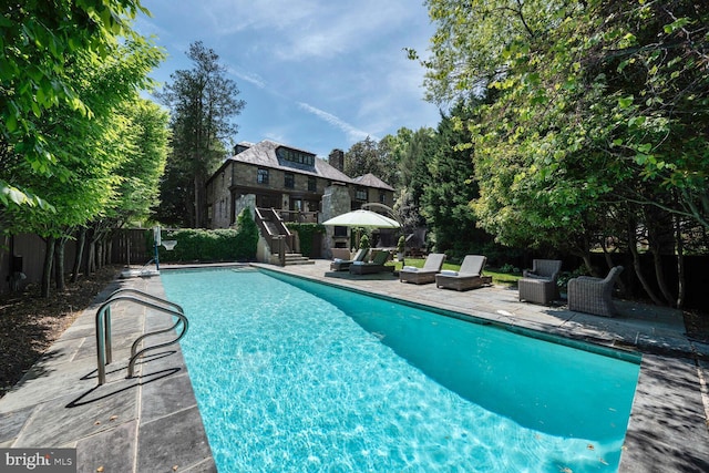 5033 Tilden St NW, Washington, DC 20016 - swimming pool featuring a fenced backyard and a patio