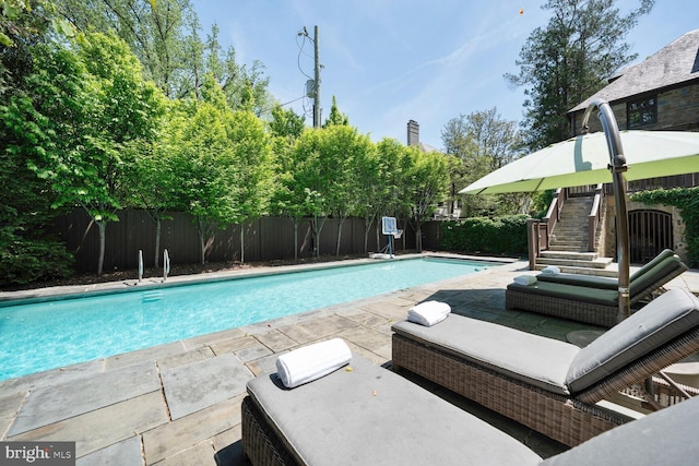 5033 Tilden St NW, Washington, DC 20016 - view of pool featuring a fenced backyard and a patio area
