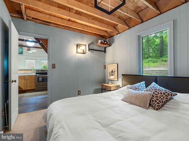171 Honeymoon Hollow Rd, Lost City, WV 26810 - carpeted bedroom featuring multiple windows and wooden ceiling with exposed beams