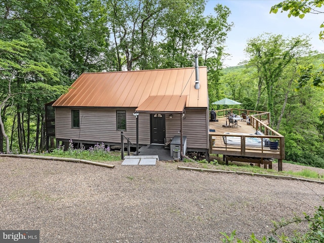 171 Honeymoon Hollow Rd, Lost City, WV 26810 - chalet / cabin with a wooden deck and metal roof