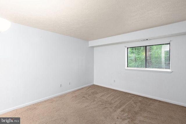 2007 Magnolia Woods Ct Unit B, Edgewood, MD 21040 - carpeted spare room featuring a textured ceiling and baseboards