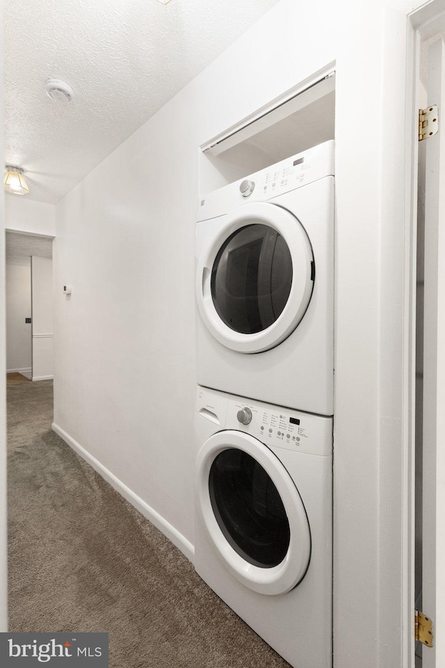 2007 Magnolia Woods Ct Unit B, Edgewood, MD 21040 - washroom with stacked washer / drying machine, carpet flooring, and a textured ceiling