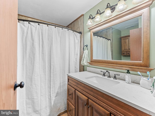 full bath featuring vanity