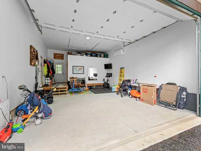 garage with an AC wall unit