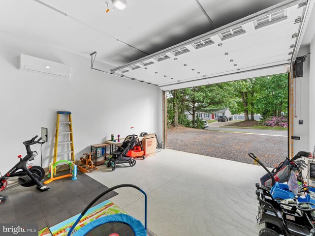 garage with a wall mounted AC