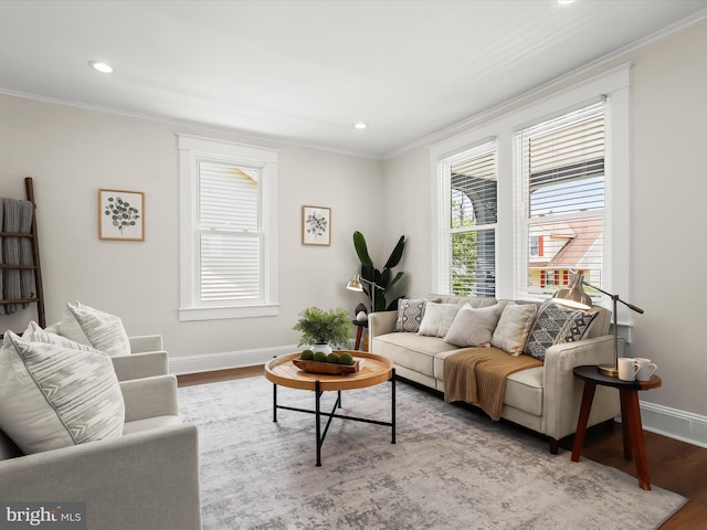 2912 Shirey Ave, Baltimore, MD 21214 - living room featuring ornamental molding, baseboards, wood finished floors, and recessed lighting