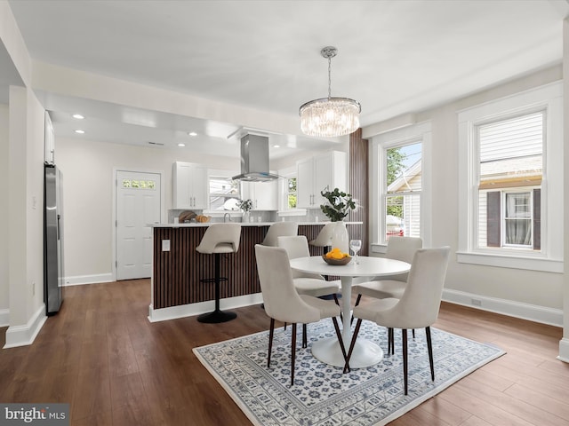 2912 Shirey Ave, Baltimore, MD 21214 - dining space featuring a chandelier, dark wood-style flooring, baseboards, and recessed lighting