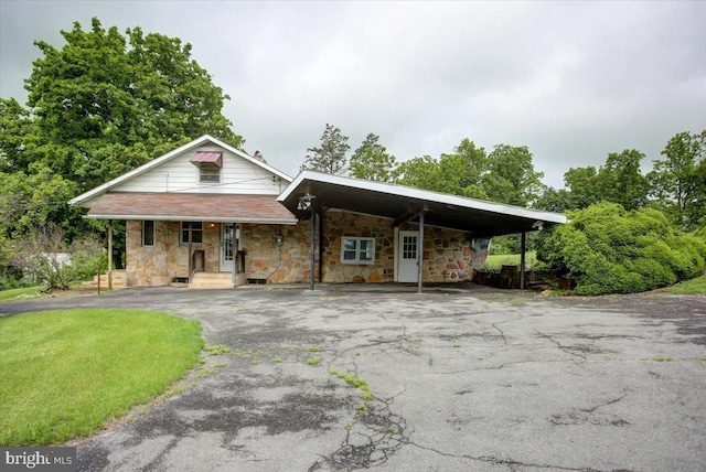 129 Shippensburg Rd, Shippensburg, PA 17257 - view of front of house featuring asphalt driveway and stone siding