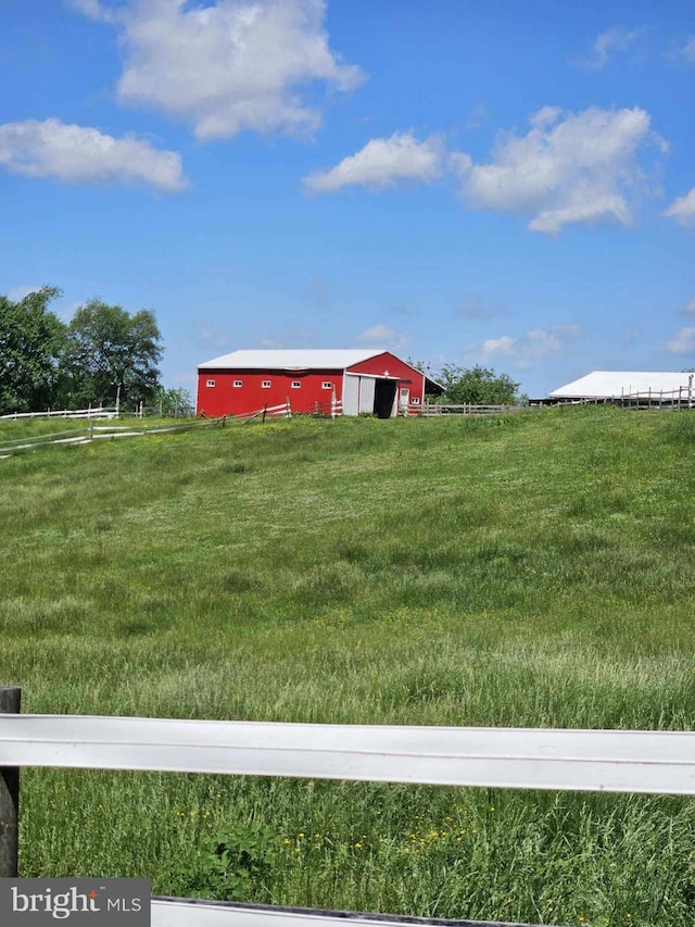 10110 Old Liberty Rd, Frederick, MD 21701 - view of grassy yard with a pole building, an outbuilding, a rural view, and a detached garage