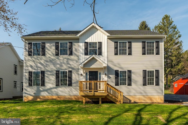 25 Railroad St, Denver, PA 17517 - view of front of home featuring a front yard and board and batten siding
