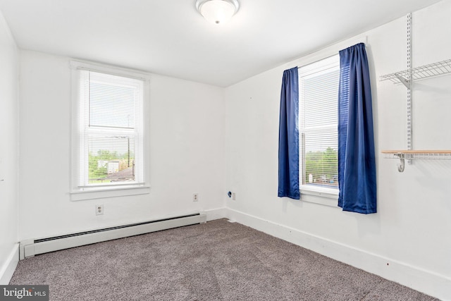 9054 William Penn Hwy, Mifflintown, PA 17059 - empty room with a baseboard radiator, carpet flooring, healthy amount of natural light, and baseboards