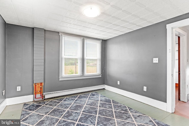 9054 William Penn Hwy, Mifflintown, PA 17059 - empty room featuring a baseboard radiator and baseboards