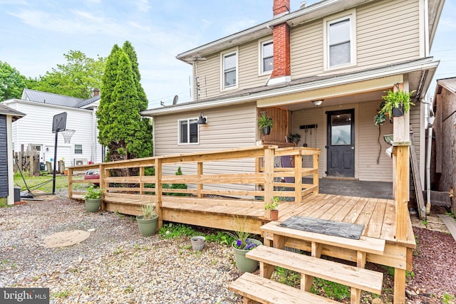 9054 William Penn Hwy, Mifflintown, PA 17059 - view of front of house featuring a wooden deck and a chimney