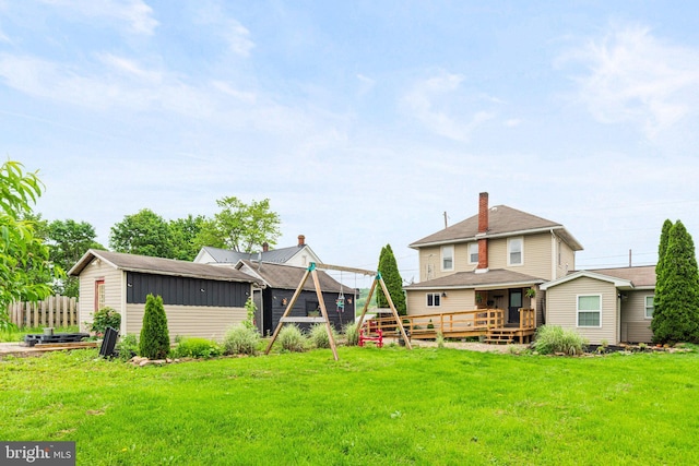 9054 William Penn Hwy, Mifflintown, PA 17059 - back of house with a deck, a chimney, and an outbuilding