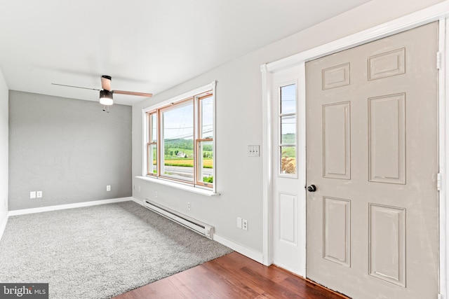 9054 William Penn Hwy, Mifflintown, PA 17059 - foyer entrance featuring a baseboard radiator, healthy amount of natural light, a ceiling fan, and baseboards