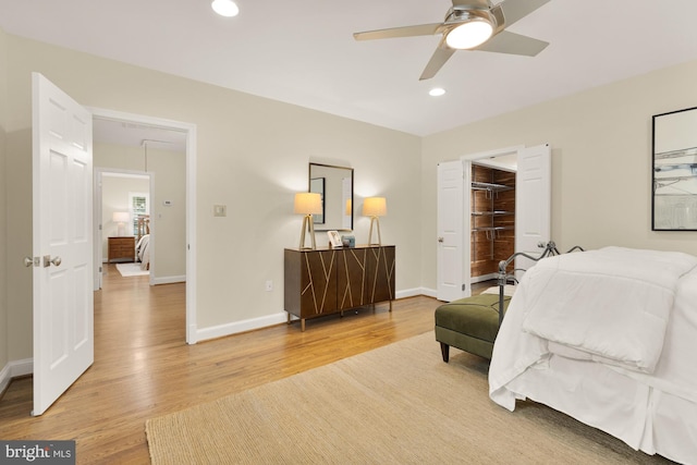 1802 24th St S, Arlington, VA 22202 - bedroom with light wood-style flooring, recessed lighting, a spacious closet, and ceiling fan