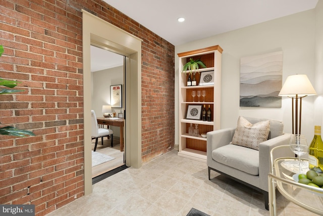 1802 24th St S, Arlington, VA 22202 - living area with brick wall, light tile patterned floors, and recessed lighting