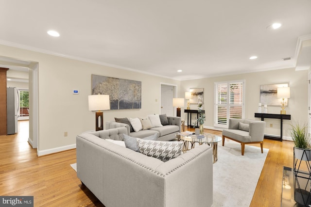 1802 24th St S, Arlington, VA 22202 - living area with healthy amount of natural light, light wood-style flooring, recessed lighting, and ornamental molding